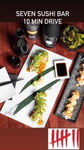 a plate of food with sushi on a table at Bozeman Basecamp in Bozeman