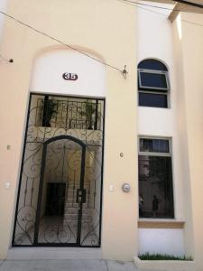 an entrance to a building with a gate at VENECIA APARTMENT, Excellent Location in Tepic