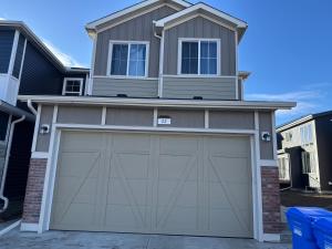 a garage door in front of a house at 5 Star Suite with Free Parking and Easy Access to Downtown in Calgary