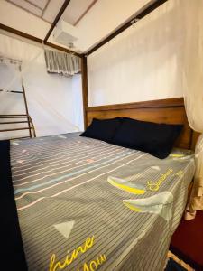 a bedroom with a bed in a tent at Madu Villa in Weligama