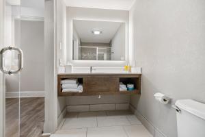 a bathroom with a sink and a mirror at The Ridges Resort on Lake Chatuge in Young Harris