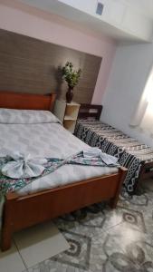 a bedroom with two beds in a room at Casa con pileta San Luis Juana Koslay in Juana Koslay 