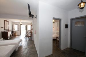 Postel nebo postele na pokoji v ubytování Ostria Studios