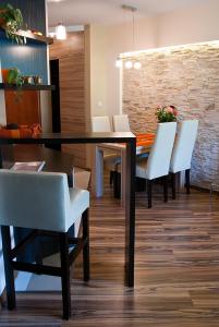 Posedenie v ubytovaní Apartament Perłowy