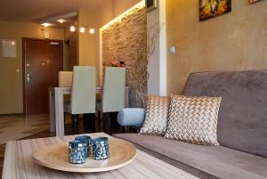 Posedenie v ubytovaní Apartament Perłowy