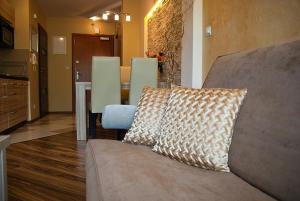 Posedenie v ubytovaní Apartament Perłowy