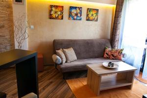 Posedenie v ubytovaní Apartament Perłowy