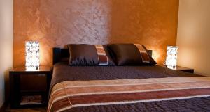 Posteľ alebo postele v izbe v ubytovaní Apartament Perłowy