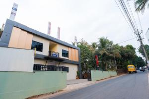 a building on the side of a street at Hotel Aeronest Residency in Calicut