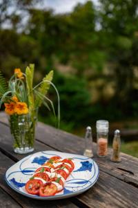 a plate of sushi on a wooden table at Resort Vishuddhialaya Pvt Ltd in Dhulikhel