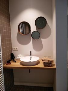 Koupelna v ubytování b&b les invités