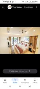 a picture of a bedroom with a large bed at Vivid sand beach resort in Revadanda