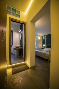 Postel nebo postele na pokoji v ubytování Marghaerita B&B
