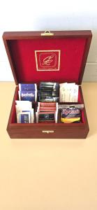 a wooden box filled with books on a table at Mariner Motel in Portland
