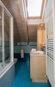 Ванная комната в Chalet La Rugiada