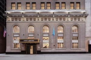 a brick building with a must centre sign in front of it at Hyatt Centric Downtown Minneapolis in Minneapolis