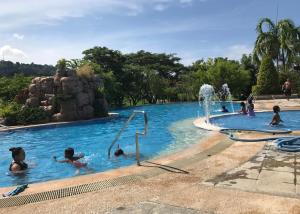a group of people in a swimming pool at a water park at 2-Storey with 4BR Villa in a High-End Subdivision in Davao City