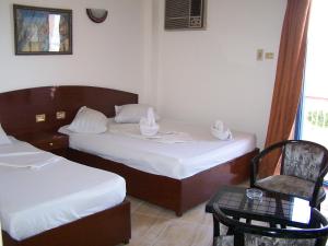Postelja oz. postelje v sobi nastanitve Eiffel Hotel Hurghada