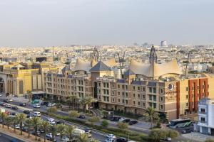 an aerial view of a city with buildings at DoubleTree by Hilton Hotel Riyadh - Al Muroj Business Gate in Riyadh