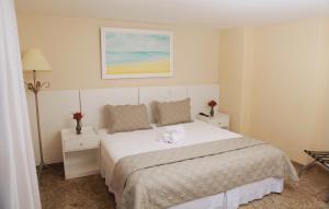 Cama ou camas em um quarto em KS Beach Hotel