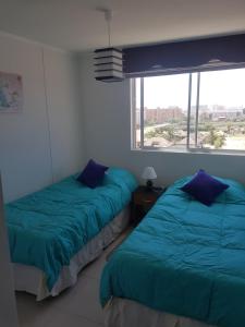 Cama o camas de una habitación en Alta Vista La Serena