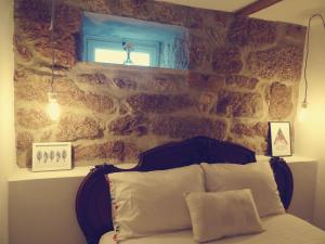 
Uma cama ou camas num quarto em Abrigo do Mezio - Country House
