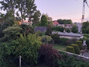 an aerial view of a garden with a crane at Ferienwohnung Michelle in Bremerhaven