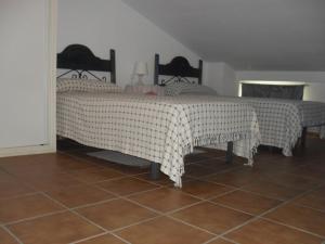A bed or beds in a room at Alcaraván 32