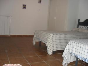 A bed or beds in a room at Alcaraván 32