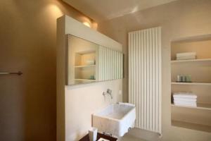 Um banheiro em Villa Rosmarino