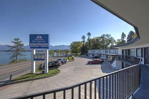 a view from a balcony of a building with a sign at Americas Best Value Inn Polson in Polson
