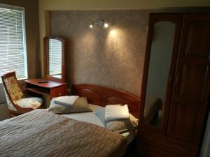 Postel nebo postele na pokoji v ubytování Family Hotel Kartala