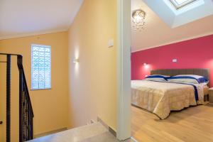 Postel nebo postele na pokoji v ubytování Villa Mare & Monti Istra + 37 fotografií