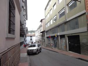 a car parked on the side of a street at Escocie - Centro Historico in Quito