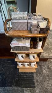 a coffee table with rolls of toilet paper on it at スマートホテル福島駅前店 in Fukushima +9 photos