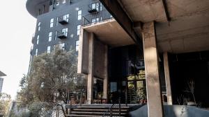 a building with stairs in front of a building at BlackBrick Sandton Two in Johannesburg