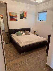 a bedroom with a bed in a room at Relax Walding in Jörgensbühl +12 photos
