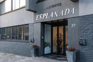 a building with a sign that reads esplanada at Esplanada Studios in Genk