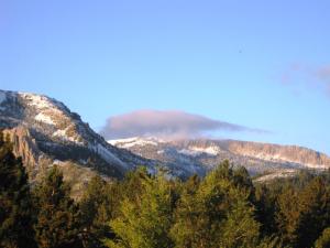 a mountain range with trees and mountains at The Mammoth Creek Inn in Mammoth Lakes