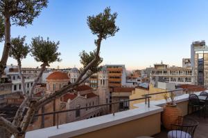 a balcony with a view of the city at EV 11 Athens in Athens