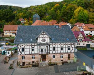a large building with a gray roof at Gutshof Vogt in Geismar