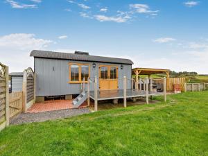 a tiny house with a deck and a playground at 1 Bed in Rhayader oc-90285 in Saint Harmon +13 photos