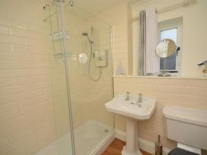 a bathroom with a shower and a sink at 2 Bed in Minehead oc-75338 in Minehead +13 photos