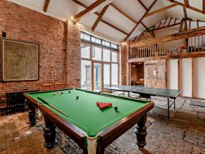 a large room with a pool table in it at 2 Bed in Doncaster oc-93150 in Mattersey