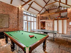 a large room with a pool table in it at 3 Bed in Doncaster oc-91307 in Mattersey