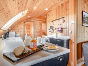 a kitchen with a table with food on it at 2 Bed in Rhayader oc-90279 in Saint Harmon