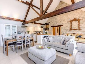 an open living room with a dining room and kitchen at 3 Bed in Chippenham oc-77334 in Chippenham +17 photos