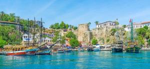 a group of boats docked in a body of water at Moon City in Antalya +6 photos