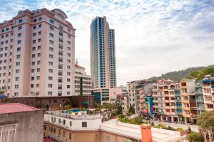 a view of a city with tall buildings at Alex Ha Long Hotel in Ha Long +46 photos