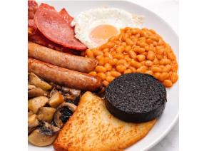 a plate of breakfast food with eggs beans and toast at Caladh Inn in Stornoway +19 photos